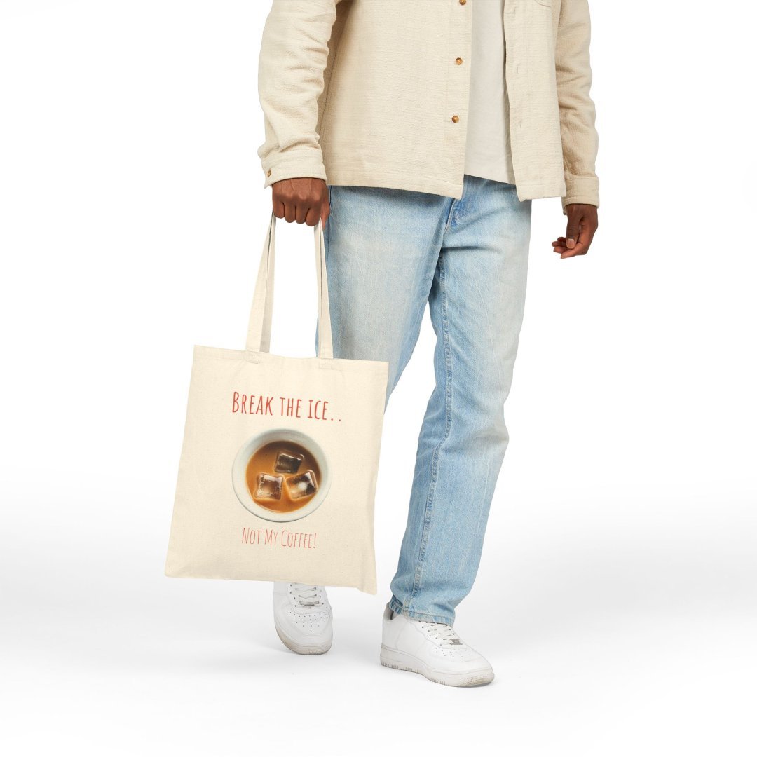 10225097498359048013_2048.jpeg Person holding a tote bag with text 'Break the Ice... Not My Coffee!' and image of iced coffee.