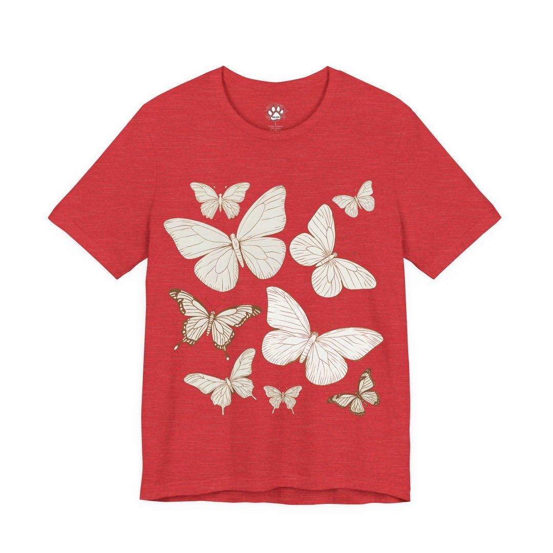 107797171516923550_2048.jpeg Red t-shirt with white butterfly illustrations.