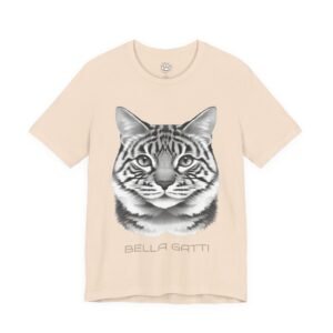 Bella Gatti Tabby Portrait T-shirt Bella Gatti Tabby Portrait Tee. Light beige t-shirt with a grayscale tiger-striped cat head and "BELLA GATTI" text.