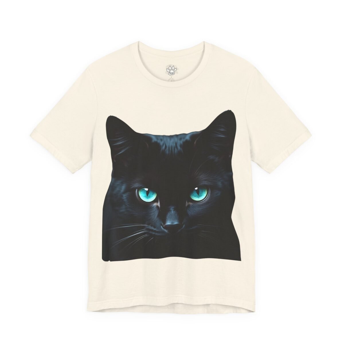 15949851142828018973_2048.jpeg Cream t-shirt featuring a black cat with glowing blue eyes.