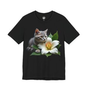 Bella Gatti Regal Tabby Unisex Graphic Tee Whiskers & Magnolia Unisex Graphic Tee. Black t-shirt with a grey tabby kitten next to a white flower and green leaves.