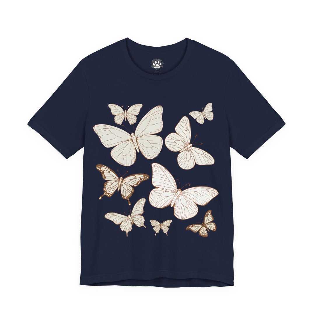 5204668945350222202_2048.jpeg Navy blue t-shirt with a design of white butterflies.