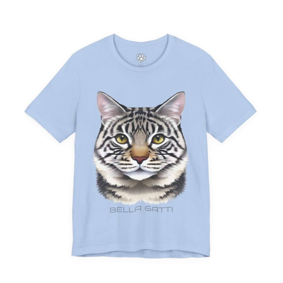 777296202689769193_2048-3.jpeg Light blue t-shirt featuring a realistic tabby cat face with yellow eyes and "BELLA GATTI" text below it.