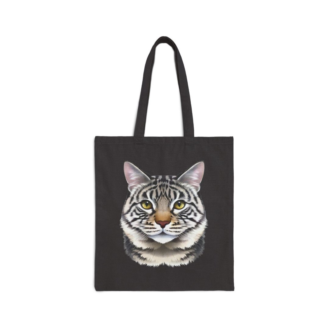 Realistic Tabby Cat Illustration Cotton Canvas Tote Bag. Black tote bag with a realistic cat face illustration.