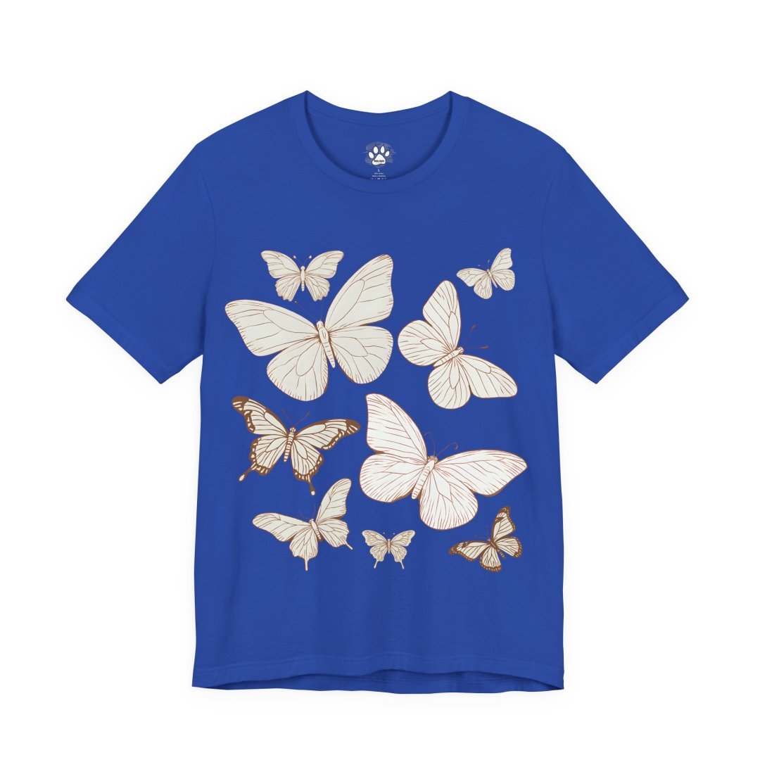 9318135480621229337_2048.jpeg Blue t-shirt with white and brown butterfly design.