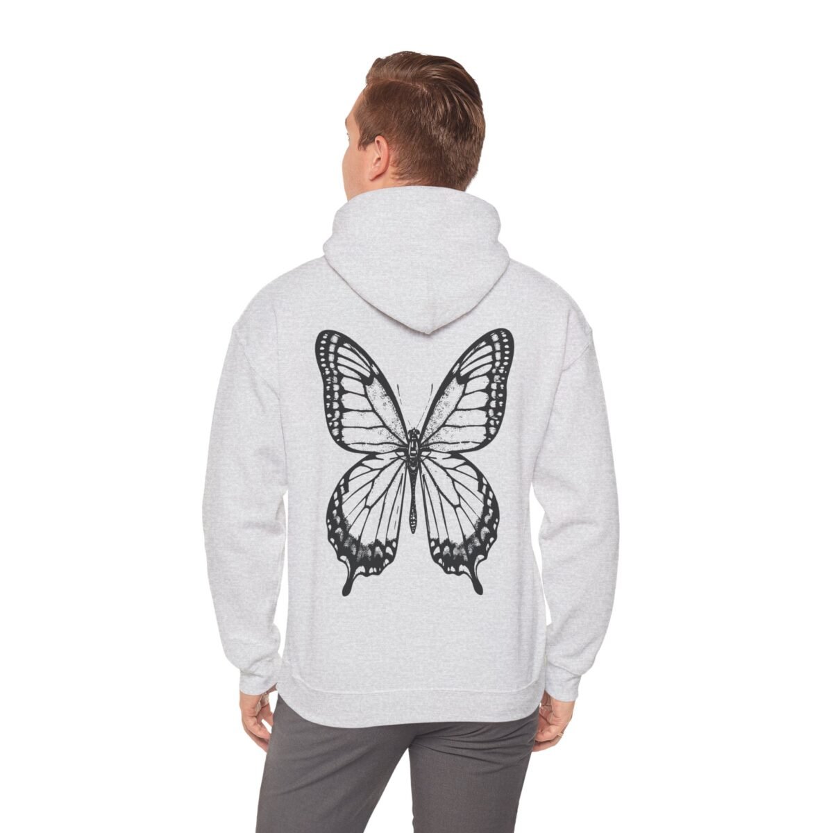 16734603058464477852_2048.jpeg Back of a person wearing a light grey hoodie with a large black and white butterfly design.