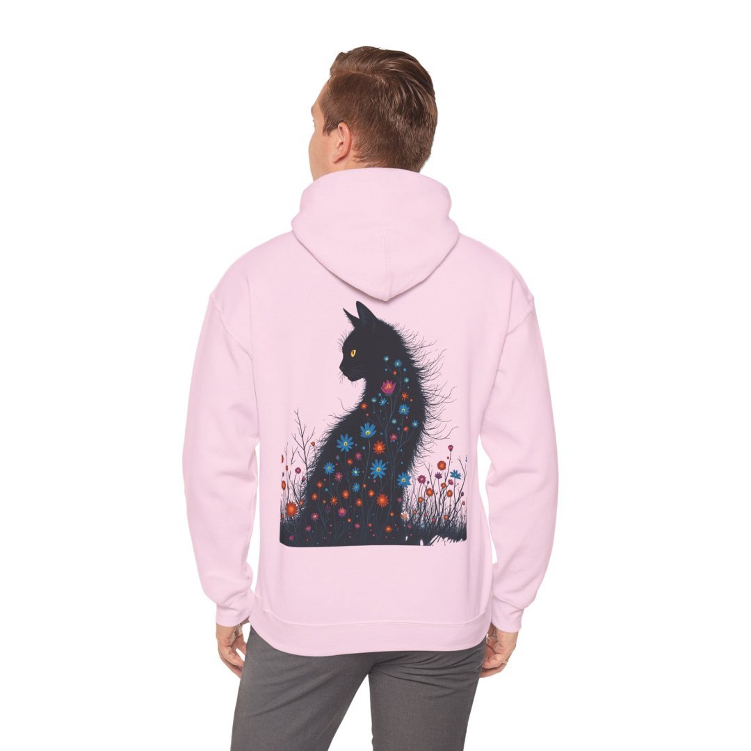 1990264416819659928_2048.jpeg Person wearing a pink hoodie with a floral cat design on the back.