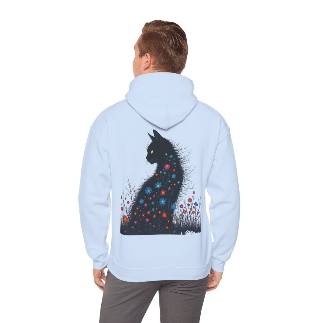 6574279797834671063_2048.jpeg Person wearing a hoodie with a floral cat design on the back.