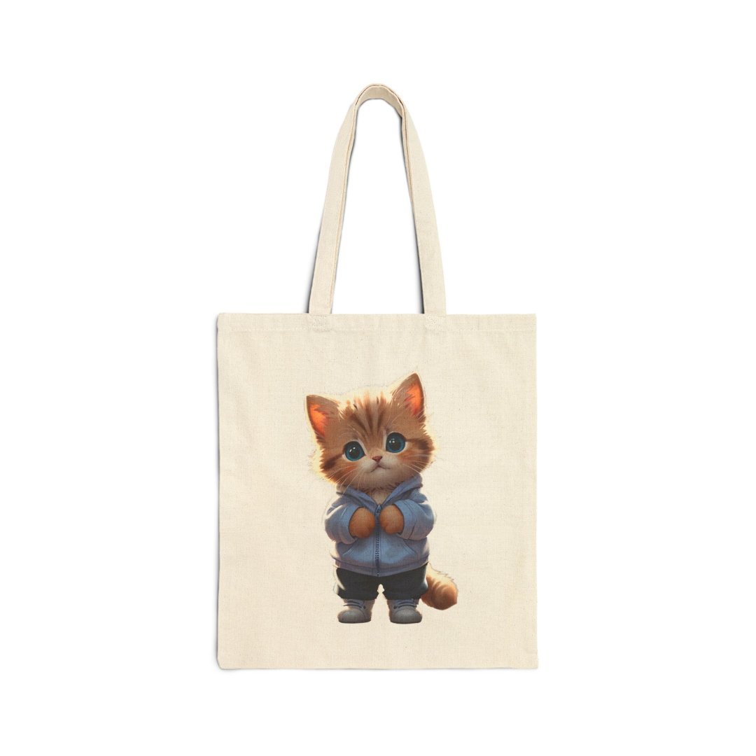 10071708074466335048_2048.jpeg Cute cartoon cat in a hoodie on a tote bag.