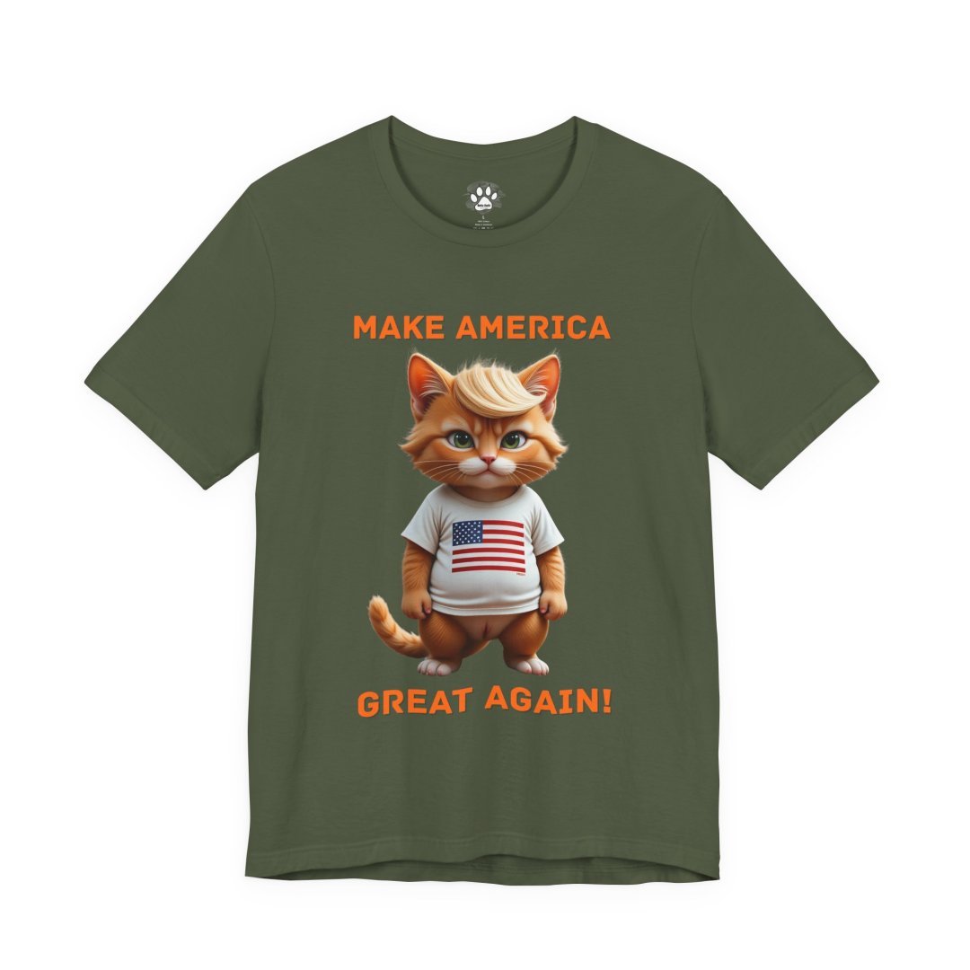 1026121171610365045_2048.jpeg Green t-shirt with a cartoon cat wearing an American flag shirt and text 'Make America Great Again'.