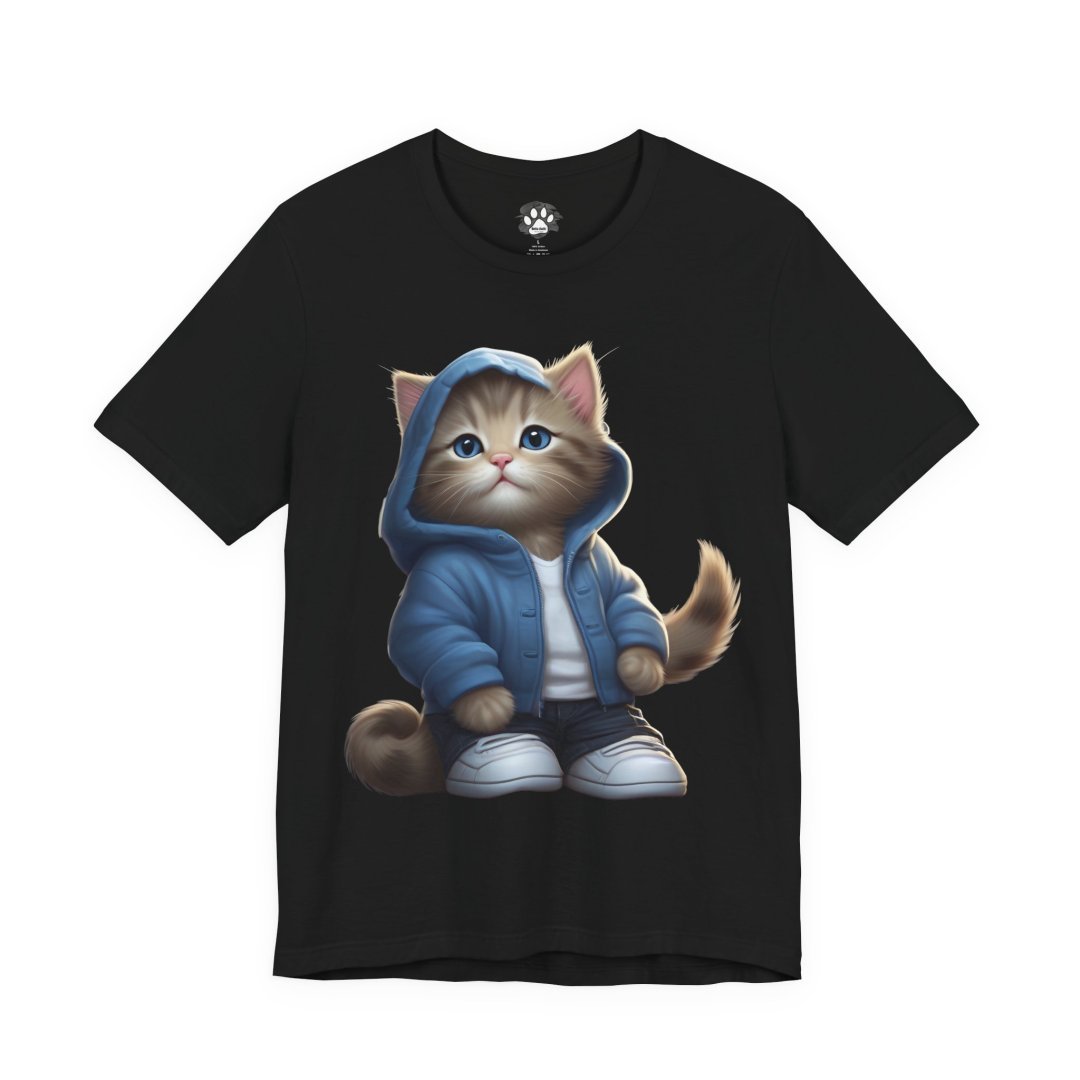 10575976398245604826_2048.jpeg Black t-shirt with a graphic of a cute kitten wearing a blue hoodie and sneakers.