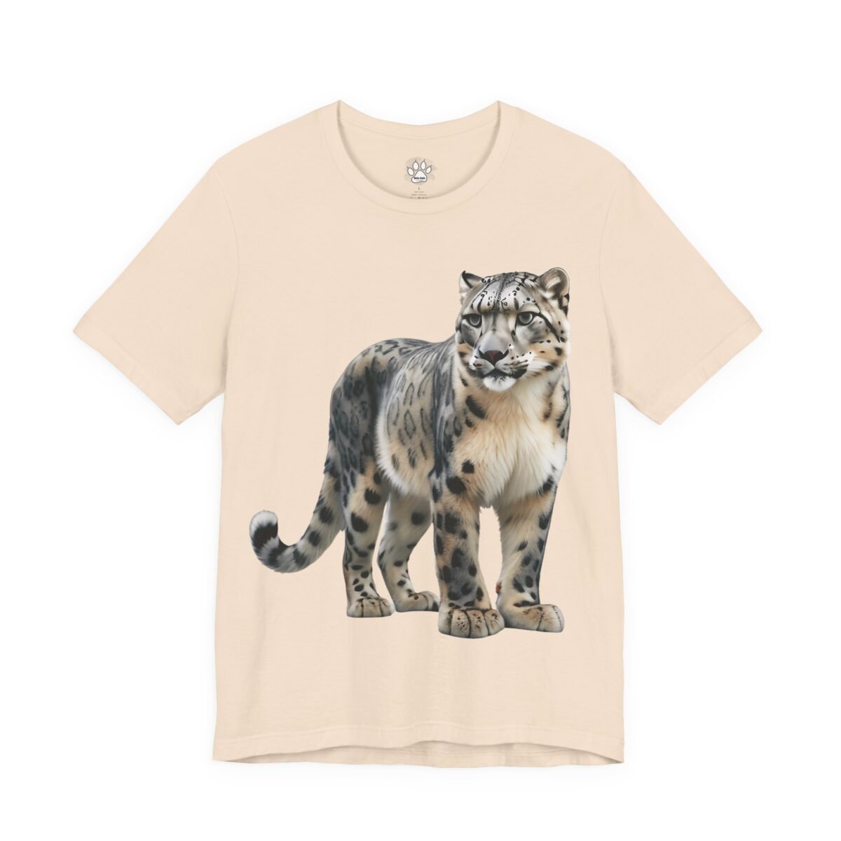 10586239304892023018_2048.jpeg Peach t-shirt featuring a snow leopard with spotted grey, white, and tan fur.