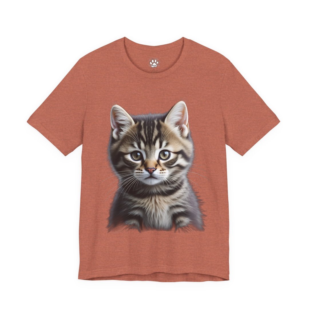 10767876328927887945_2048.jpeg Rust-colored t-shirt with a realistic kitten illustration.