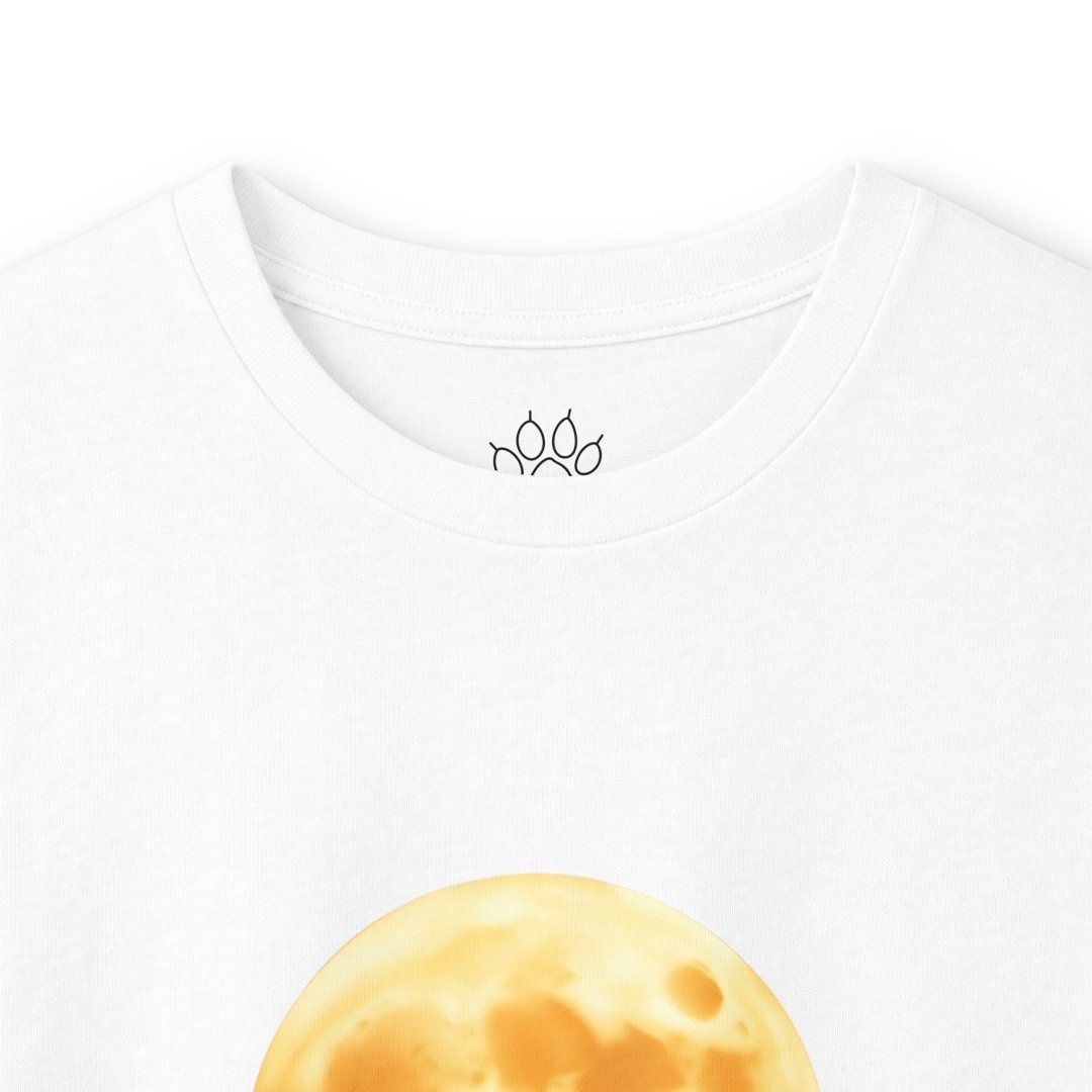 10844410182444458299_2048.jpeg White t-shirt with a yellow moon design and paw print inside the collar.