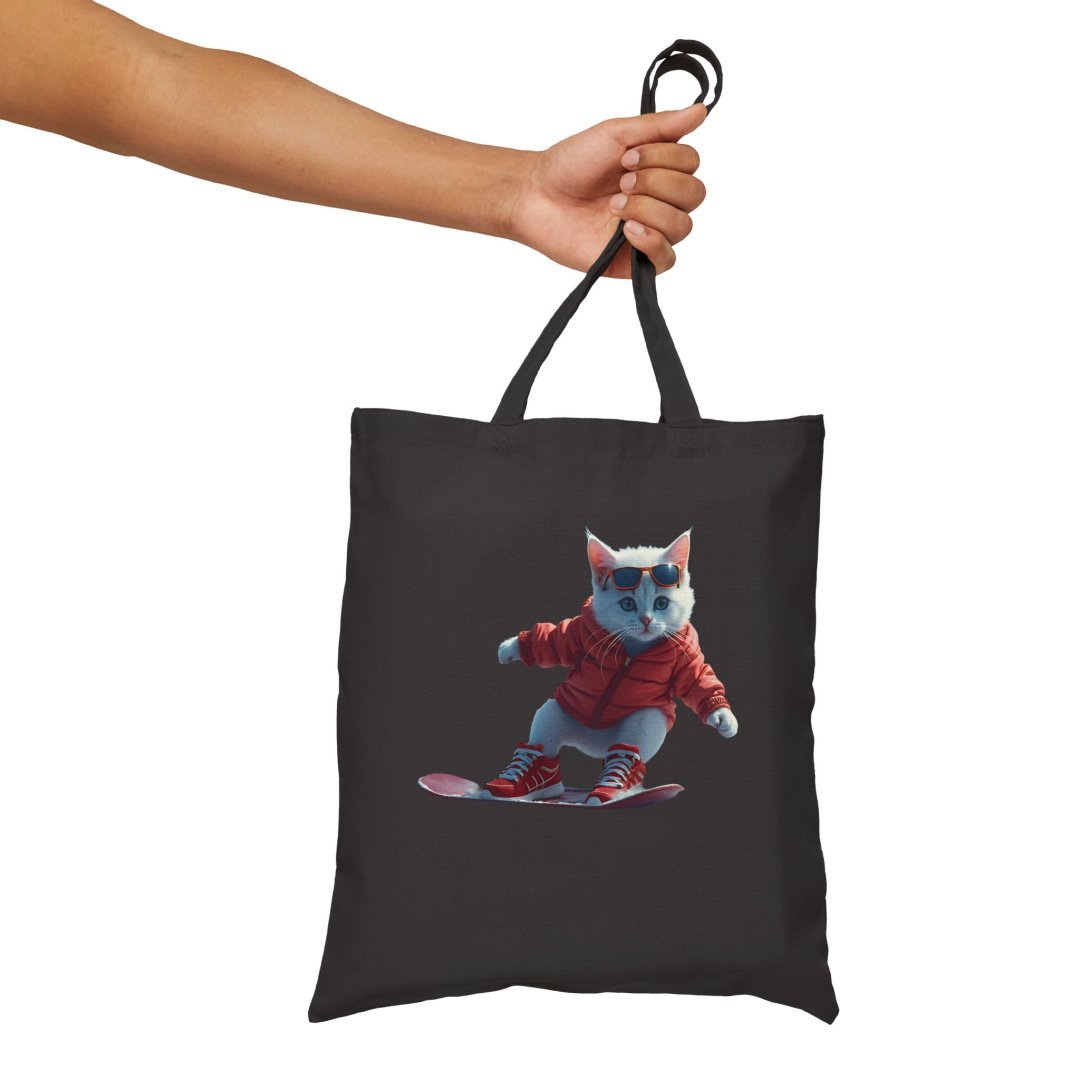 11418925124025200118_2048.jpeg Tote bag with a cat snowboarding in a red outfit.
