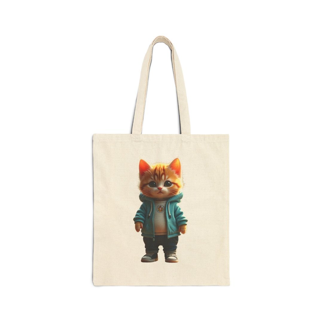 12376396645007300793_2048.jpeg Tote bag featuring a cute cartoon cat in a blue jacket.