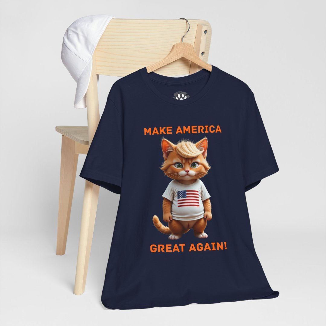 12639254022015035883_2048.jpeg Navy blue t-shirt with a cartoon cat wearing a USA flag shirt and a slogan.