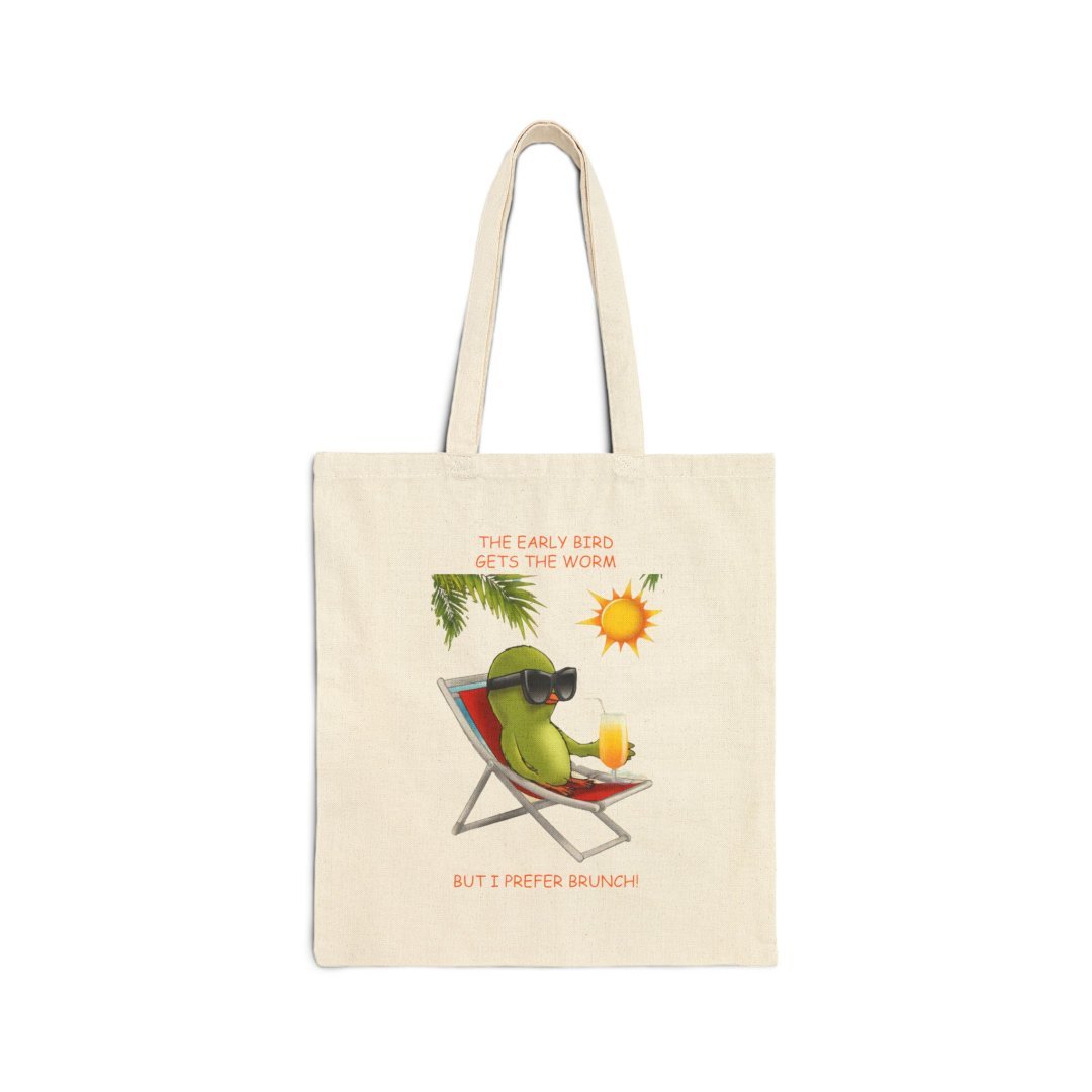 13808884191216086054_2048.jpeg Tote bag with a cartoon avocado lounging in a chair, wearing sunglasses, with text about brunch.