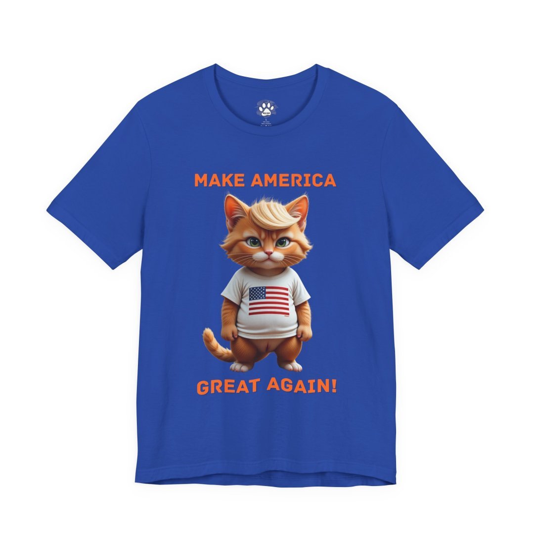 14026454641491013186_2048.jpeg Blue t-shirt with a cartoon cat wearing an American flag shirt and text 'Make America Great Again'.