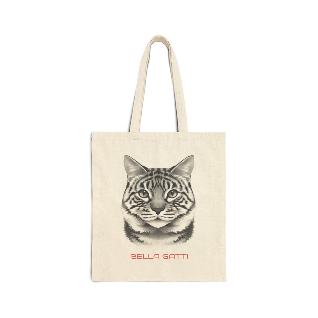 15054291269015920974_2048.jpeg Canvas tote bag with a cat face design and 'Bella Gatti' text.