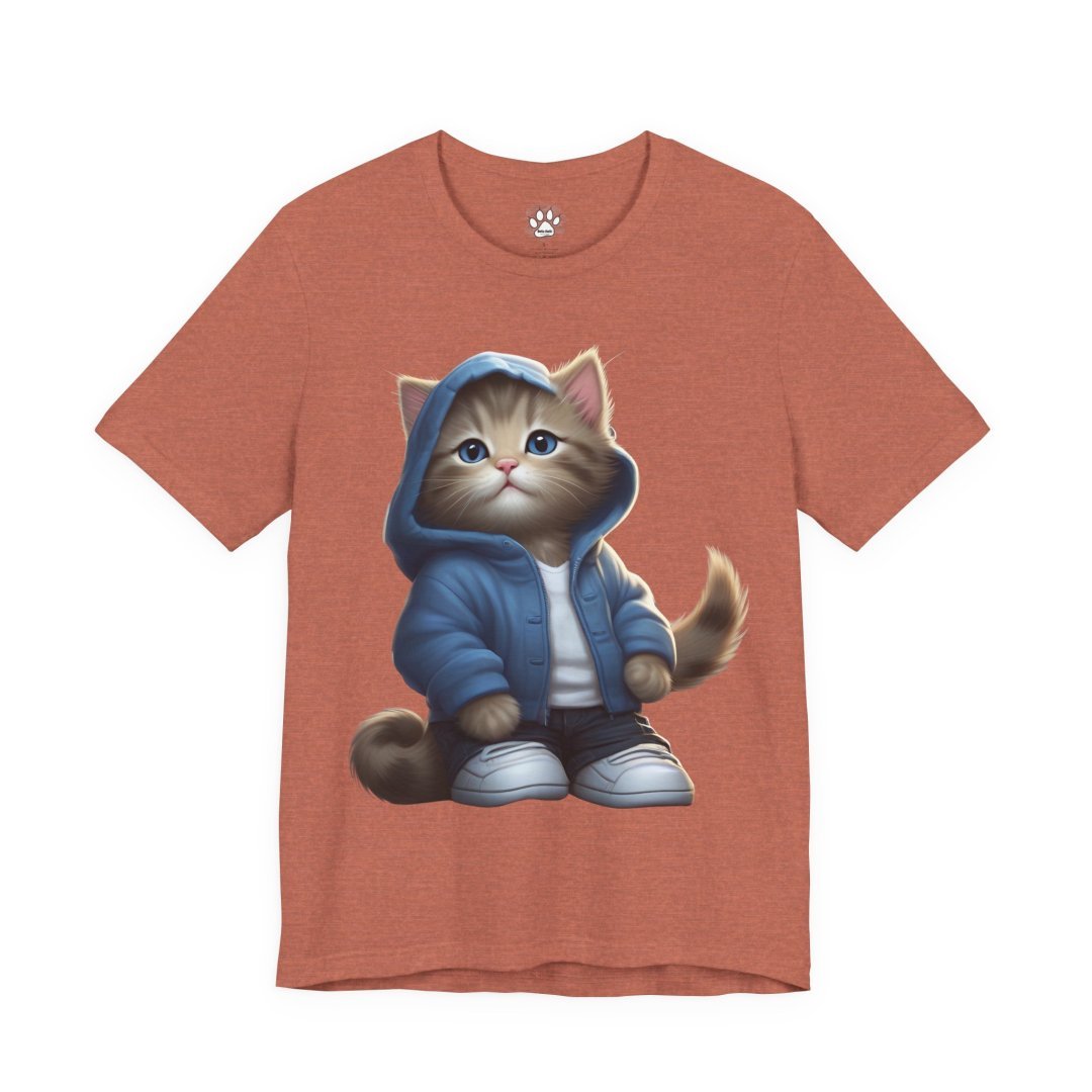 15449904924009502167_2048.jpeg Cute kitten in a blue hoodie on a brown t-shirt.