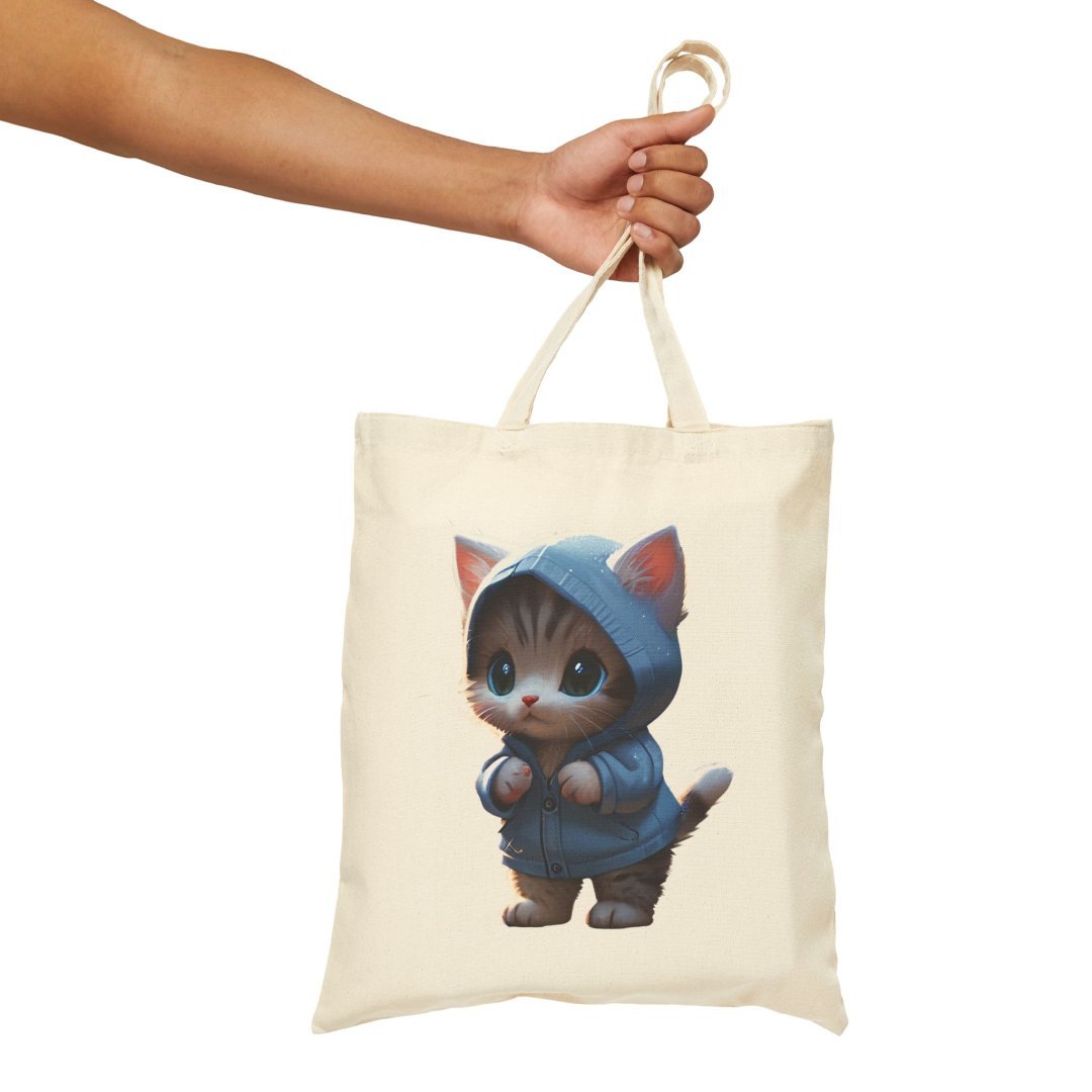 16029327914220367620_2048.jpeg Canvas tote bag with a cute kitten in a blue hoodie design.