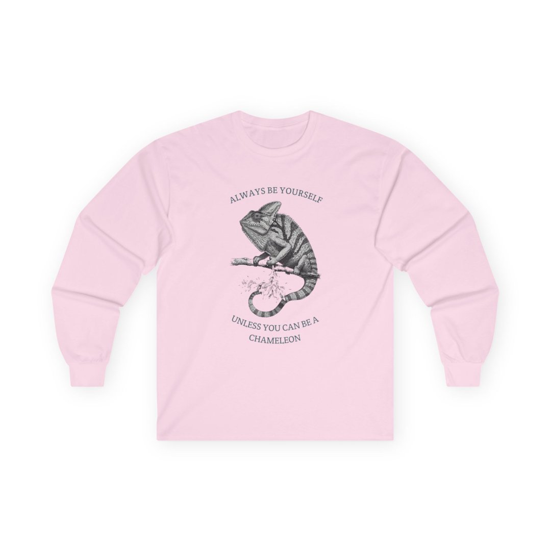 16370465873957473563_2048.jpeg Pink long-sleeve shirt with a chameleon design and motivational text.
