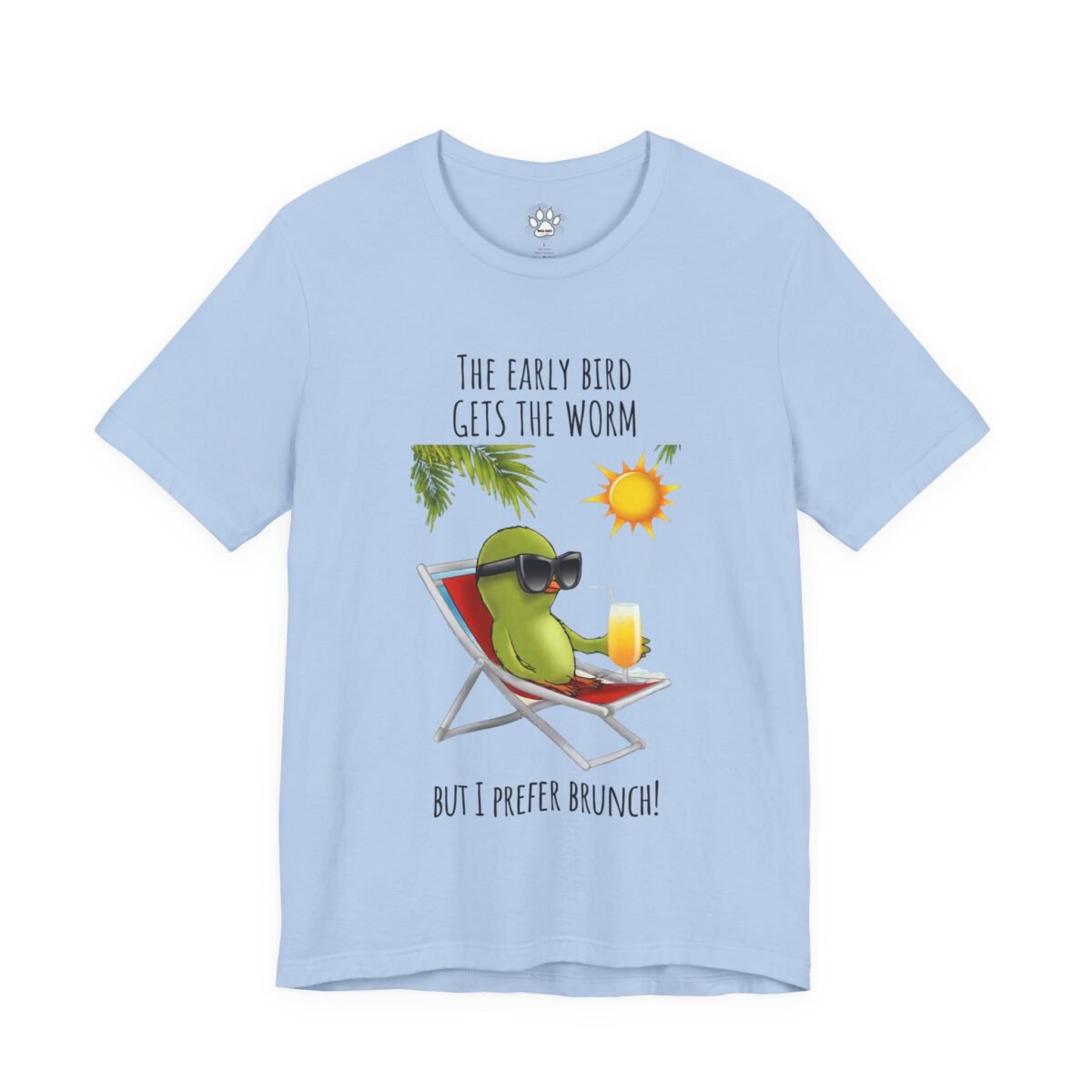 16656091398575144038_2048.jpeg A light blue t-shirt with a cartoon green bird in sunglasses lounging on a beach chair, holding a drink, with the text "THE