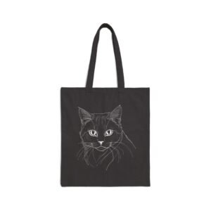 Snowboarding Cat Canvas Tote Bag Cat Sketch Canvas Tote Bag. Black tote bag with a white line drawing of a cat's face.