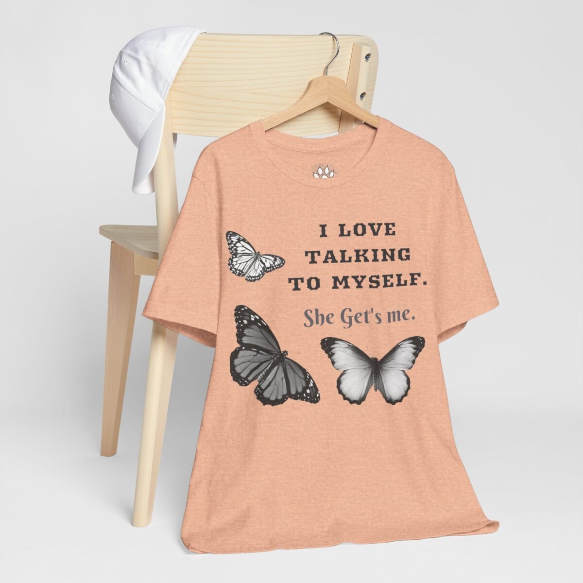 17464228510848086610_2048.jpeg Peach t-shirt with butterflies and the text "I LOVE TALKING TO MYSELF. She Get's me."