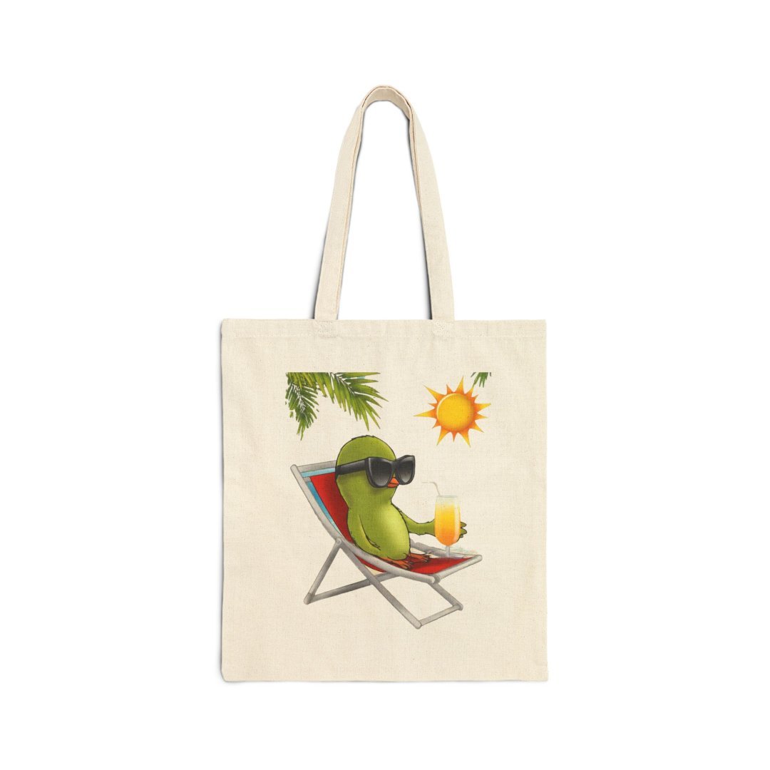 18045500562570075628_2048.jpeg Tote bag with a cartoon avocado lounging on a chair under the sun.