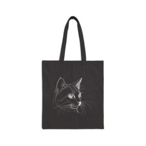 Snowboarding Cat Canvas Tote Bag Minimalist Cat Face Cotton Canvas Tote Bag. Black tote bag with a white line drawing of a cat's face.