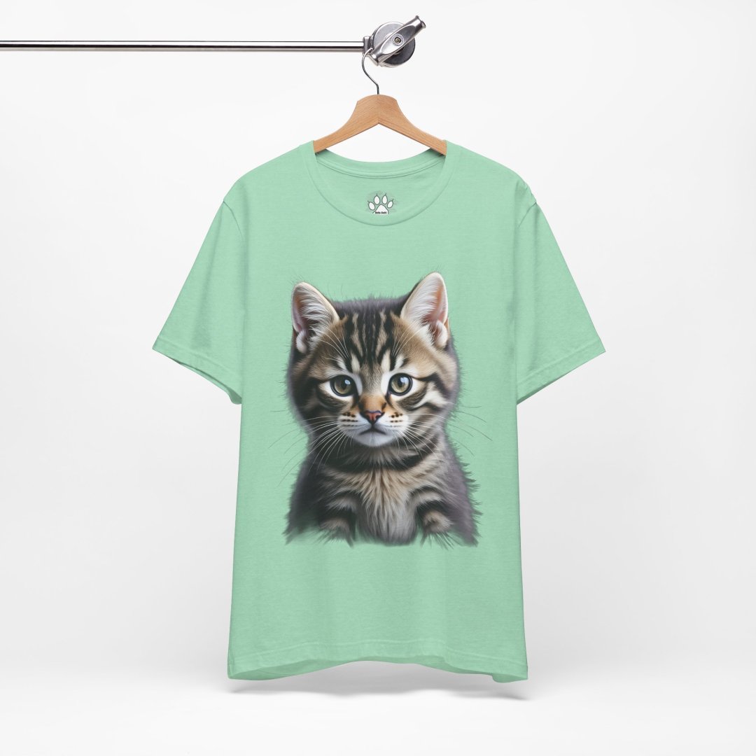18380207500836021424_2048.jpeg Mint green t-shirt with a realistic kitten print on a hanger.