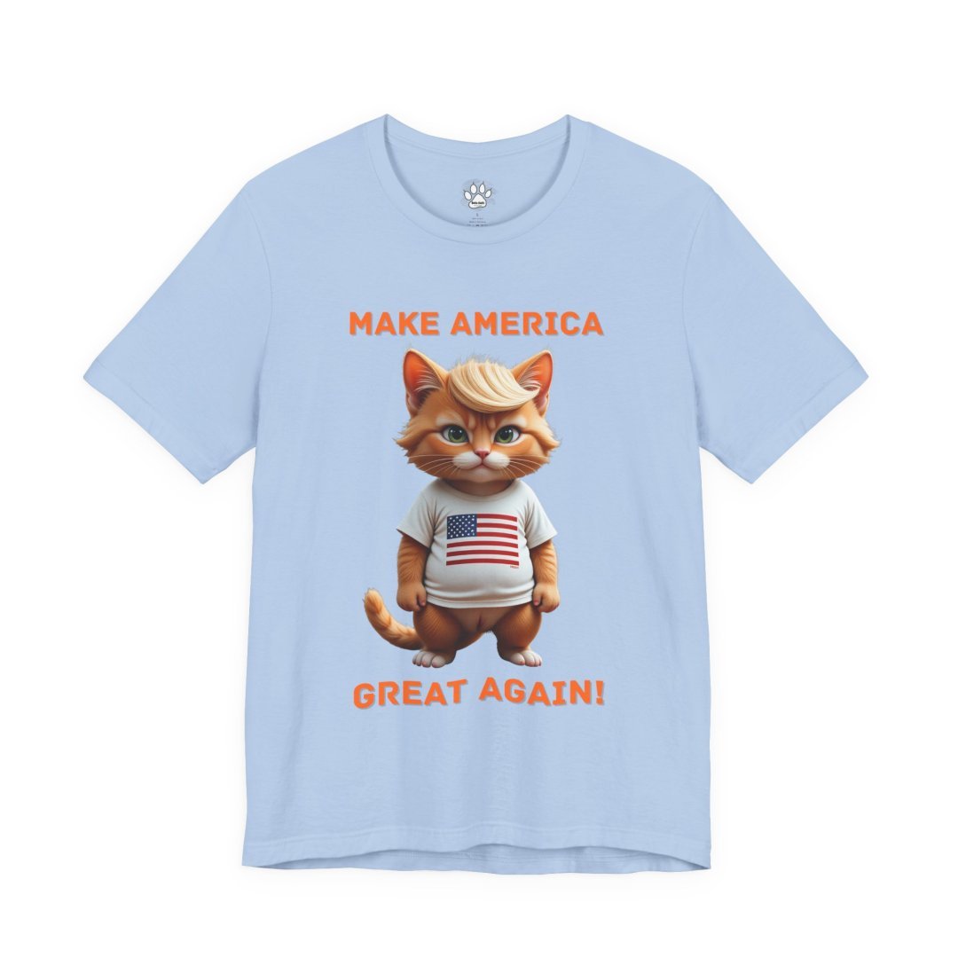 2229481074366285516_2048.jpeg Light blue t-shirt with a cartoon cat wearing a USA flag shirt and text 'Make America Great Again'.