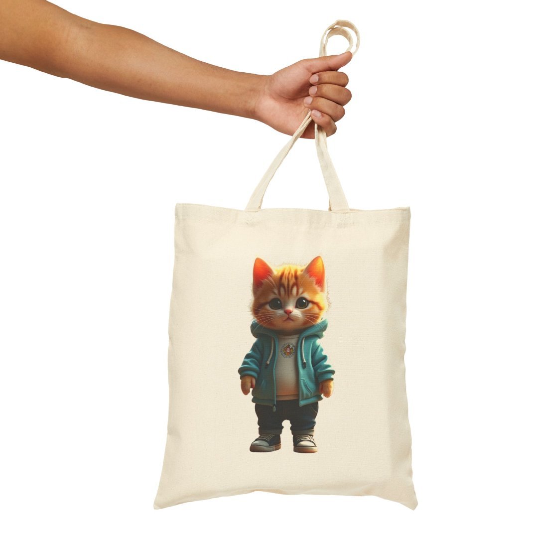 2481911173962217944_2048.jpeg Canvas tote bag with a cute cat in a jacket design.