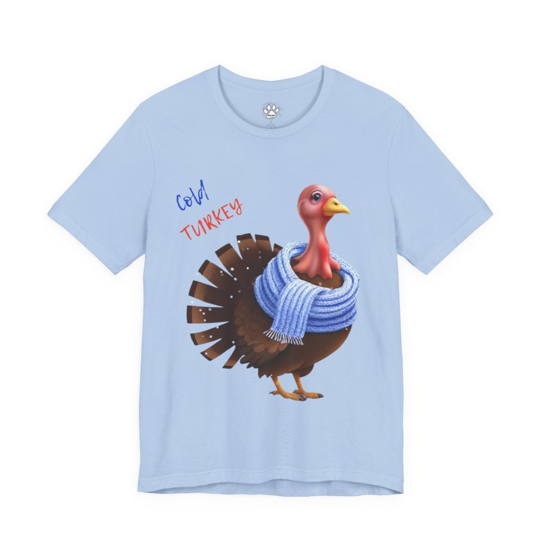 Cold Turkey Cozy Tee. Light blue t-shirt with a cartoon turkey wearing a scarf.