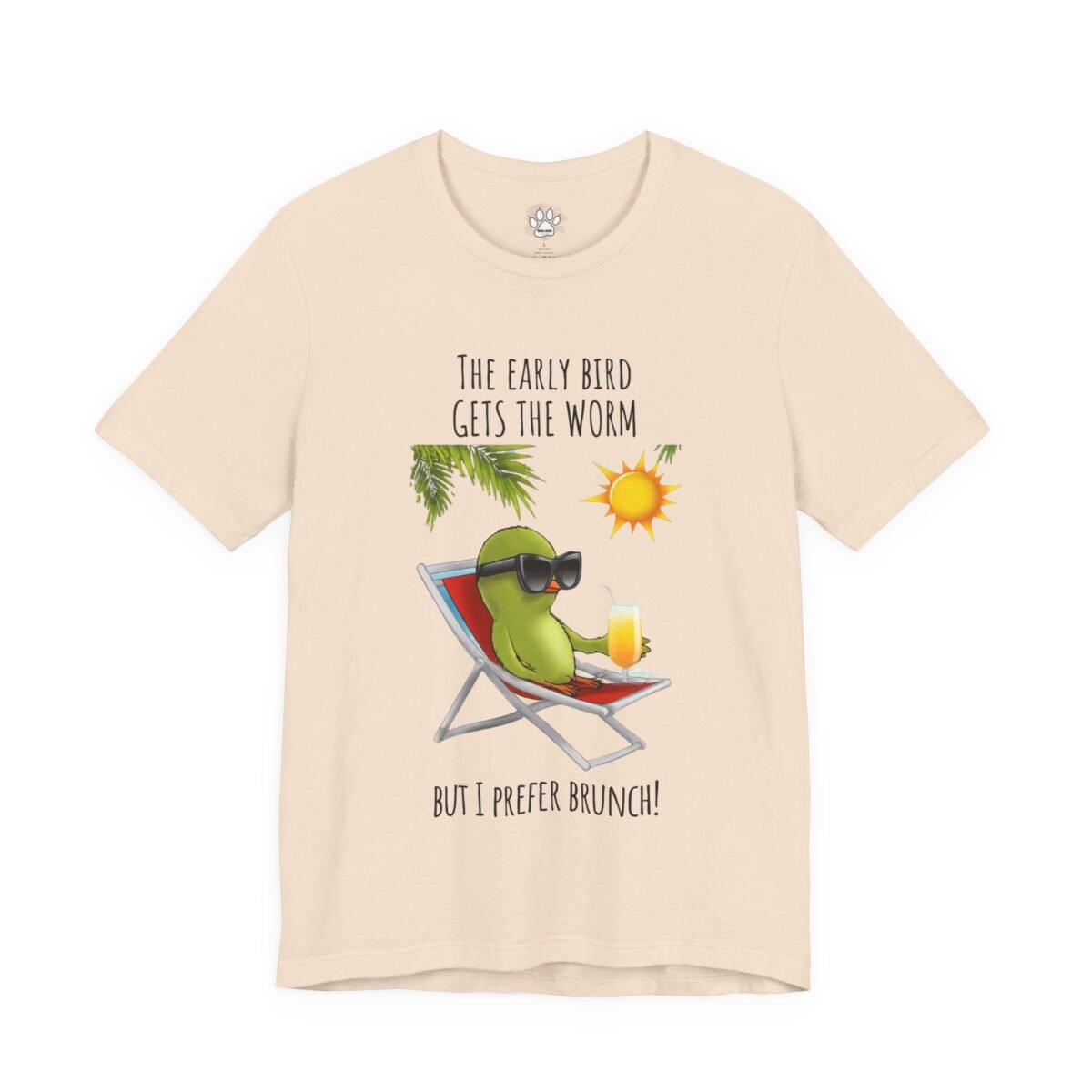 3568402036149599536_2048.jpeg Light peach t-shirt with a green bird in sunglasses lounging in a beach chair, holding a drink, and the text 'THE EARLY BIRD