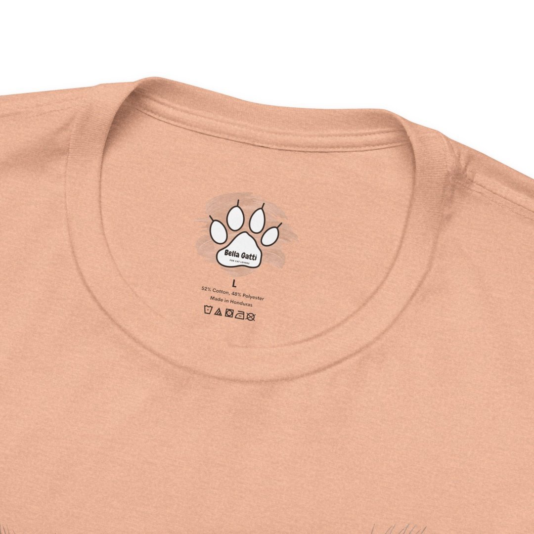 3805165212516491363_2048.jpeg Peach-colored Bella Gatti t-shirt with paw print logo on the label.