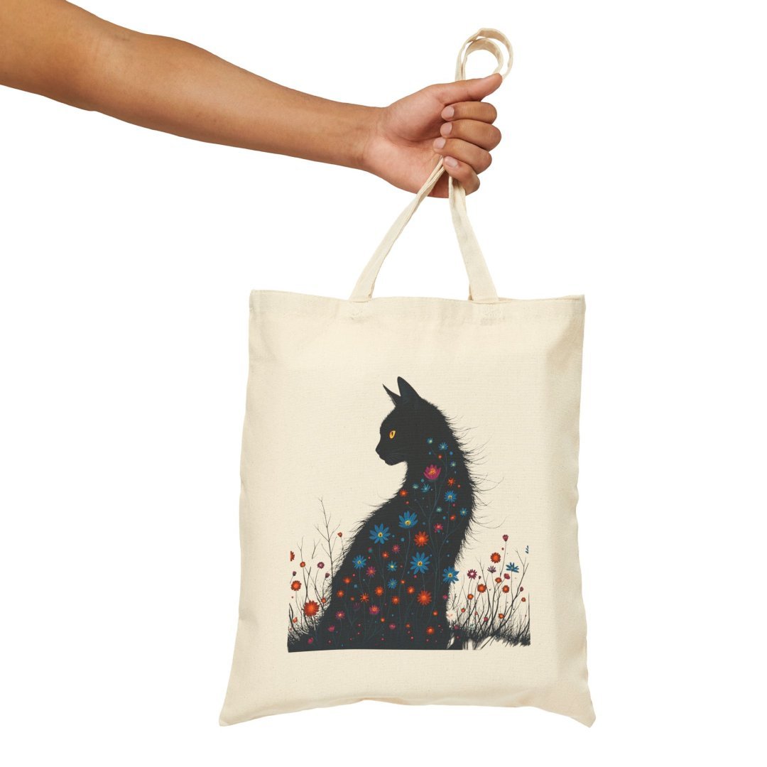 4233568300840170877_2048.jpeg Canvas tote bag with a black cat silhouette and floral design.