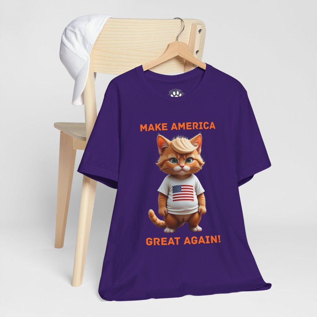4427091266220961906_2048.jpeg Purple t-shirt with a cartoon cat wearing a USA flag shirt and text 'Make America Great Again!'