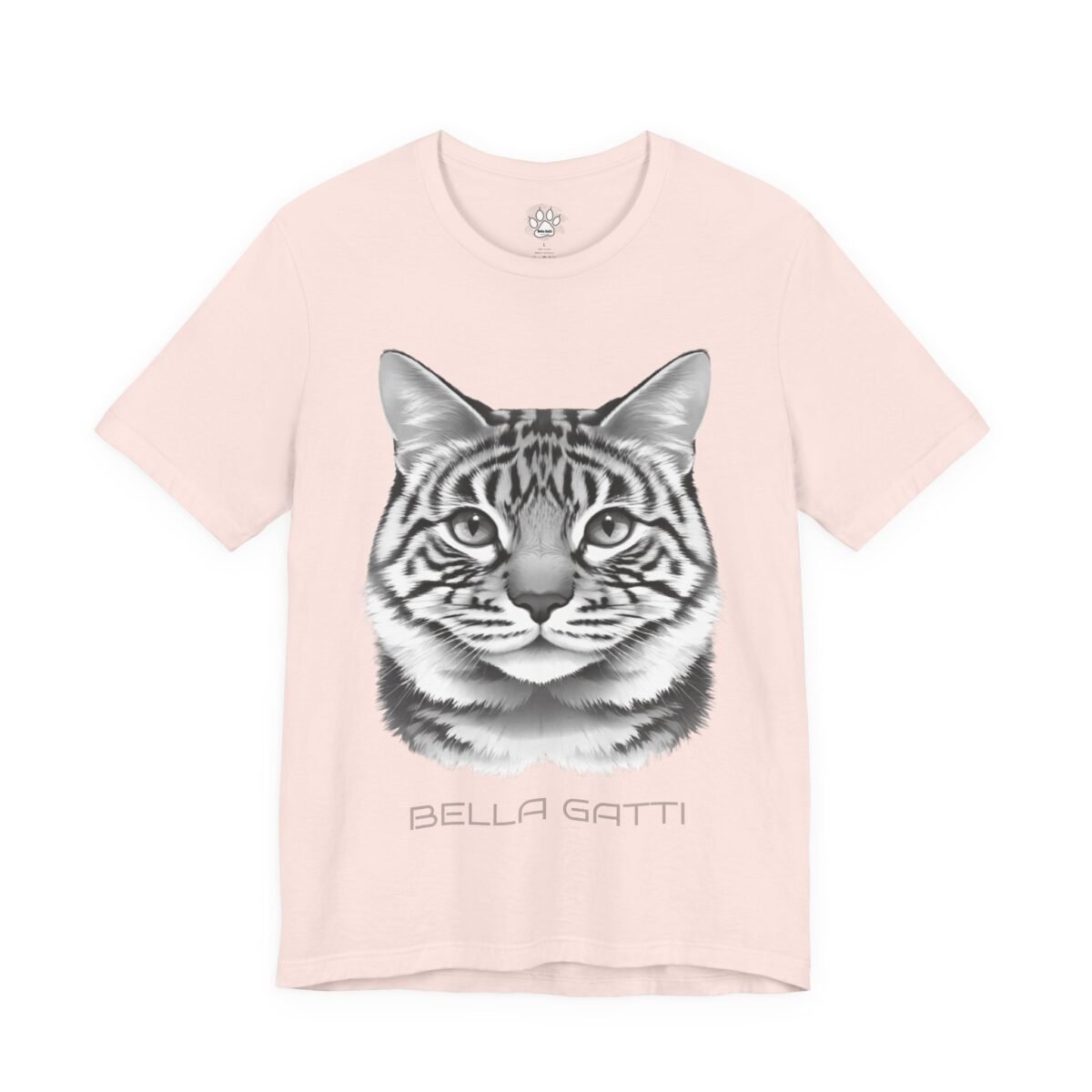 4957295085160662675_2048.jpeg Light pink t-shirt with a greyscale tiger-striped cat face and "BELLA GATTI" text.
