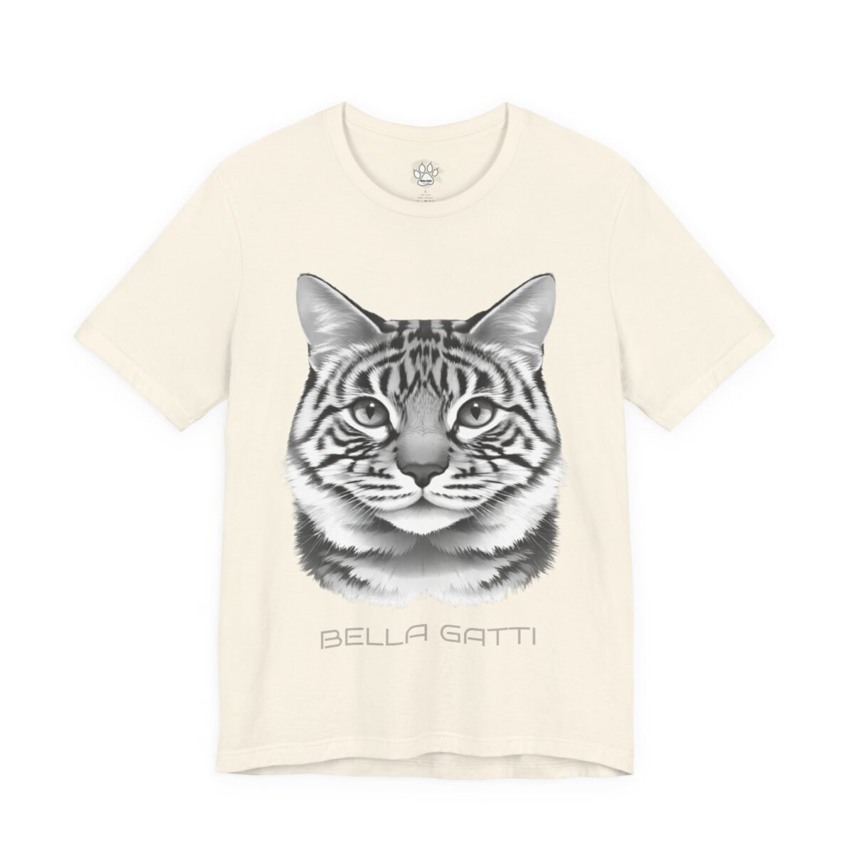 6955799267416239566_2048.jpeg Cream t-shirt with a grayscale striped cat head and "BELLA GATTI".