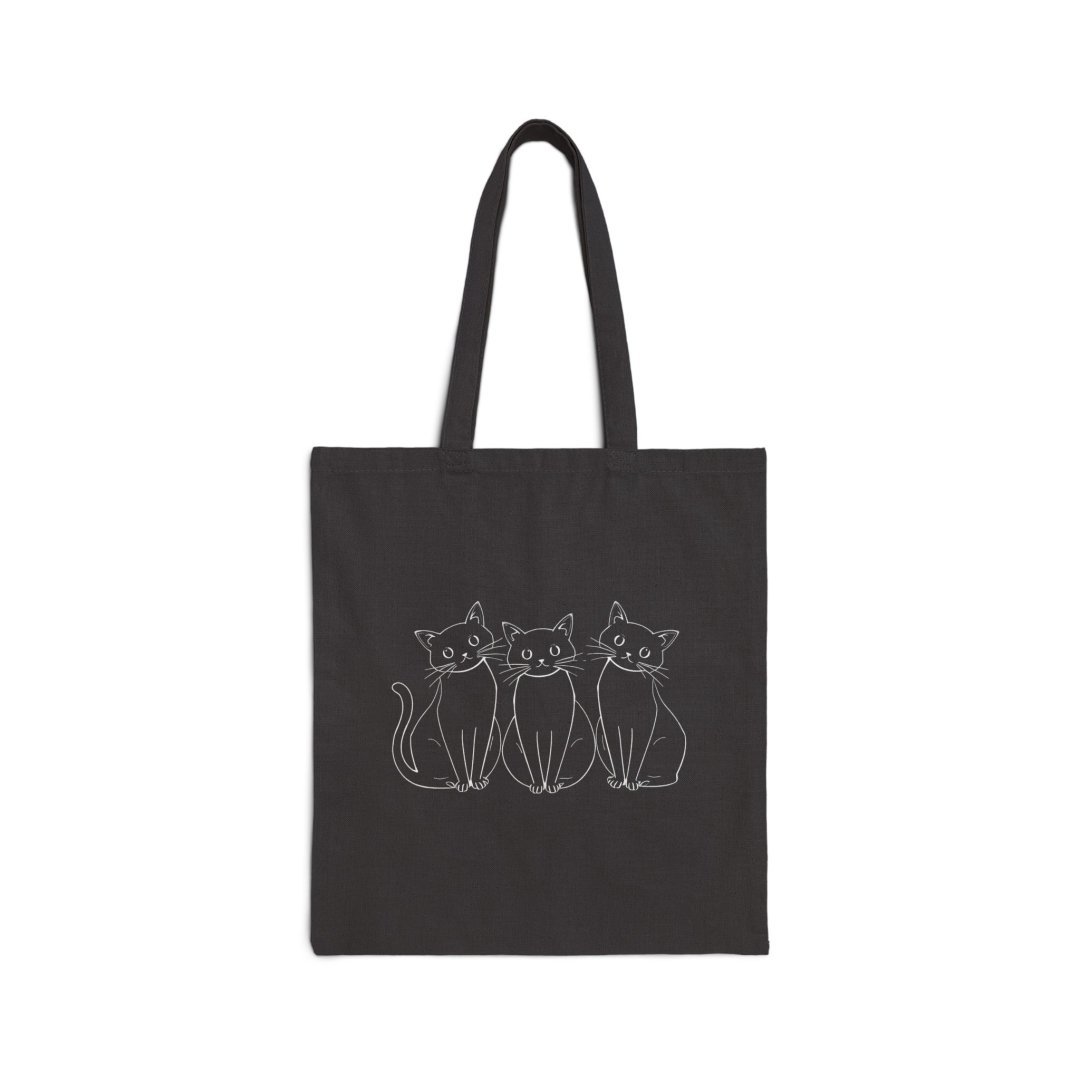 Triple Kitty Cotton Tote Bag. Black tote bag with three outlined cat illustrations.