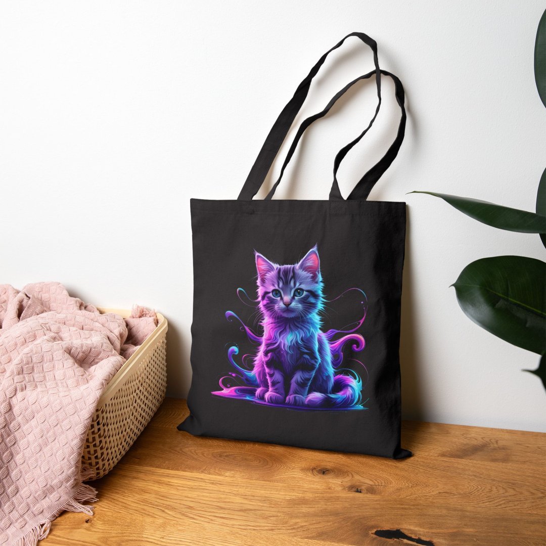 8394082414810967012_2048.jpeg Black tote bag with a colorful, artistic cat design.