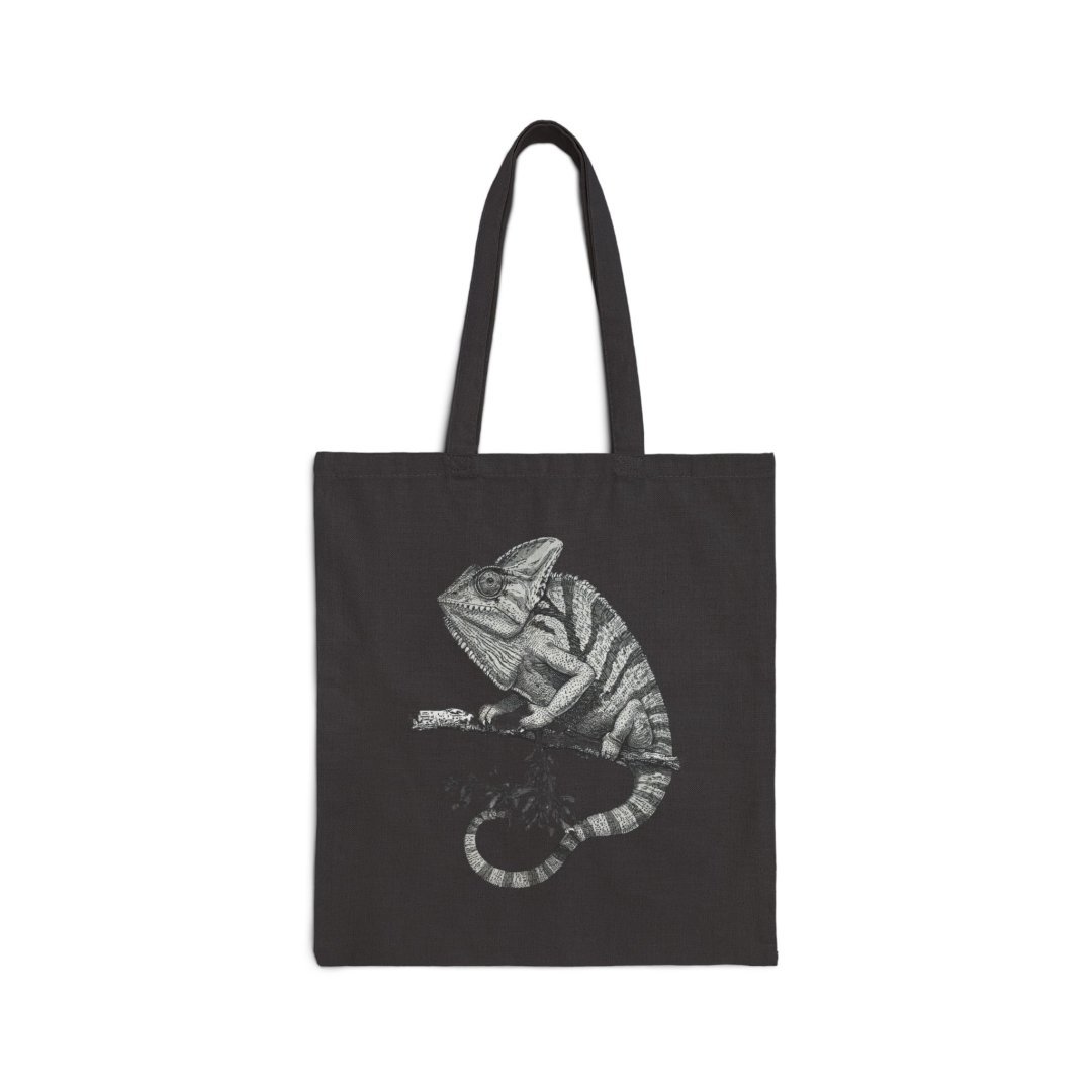 8684756410478250380_2048.jpeg Black tote bag with a detailed chameleon illustration.