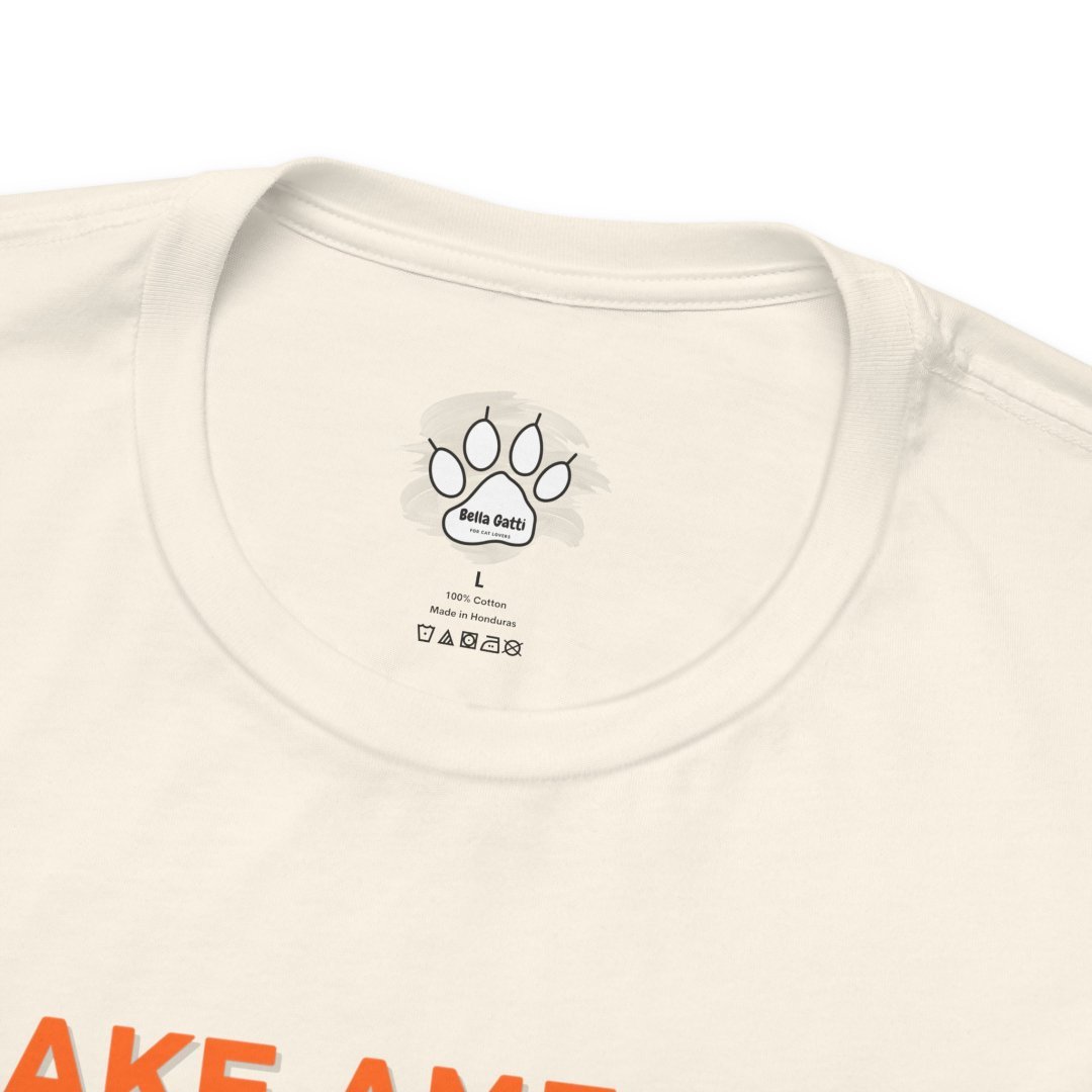 8845170415458741878_2048.jpeg Close-up of a white Bella Gatti T-shirt with orange text.