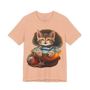 Peach t-shirt featuring a smiling kitten in a clam shell bath, next to a snail. Shellmates: Kitten & Snail Unisex Graphic T-Shirt