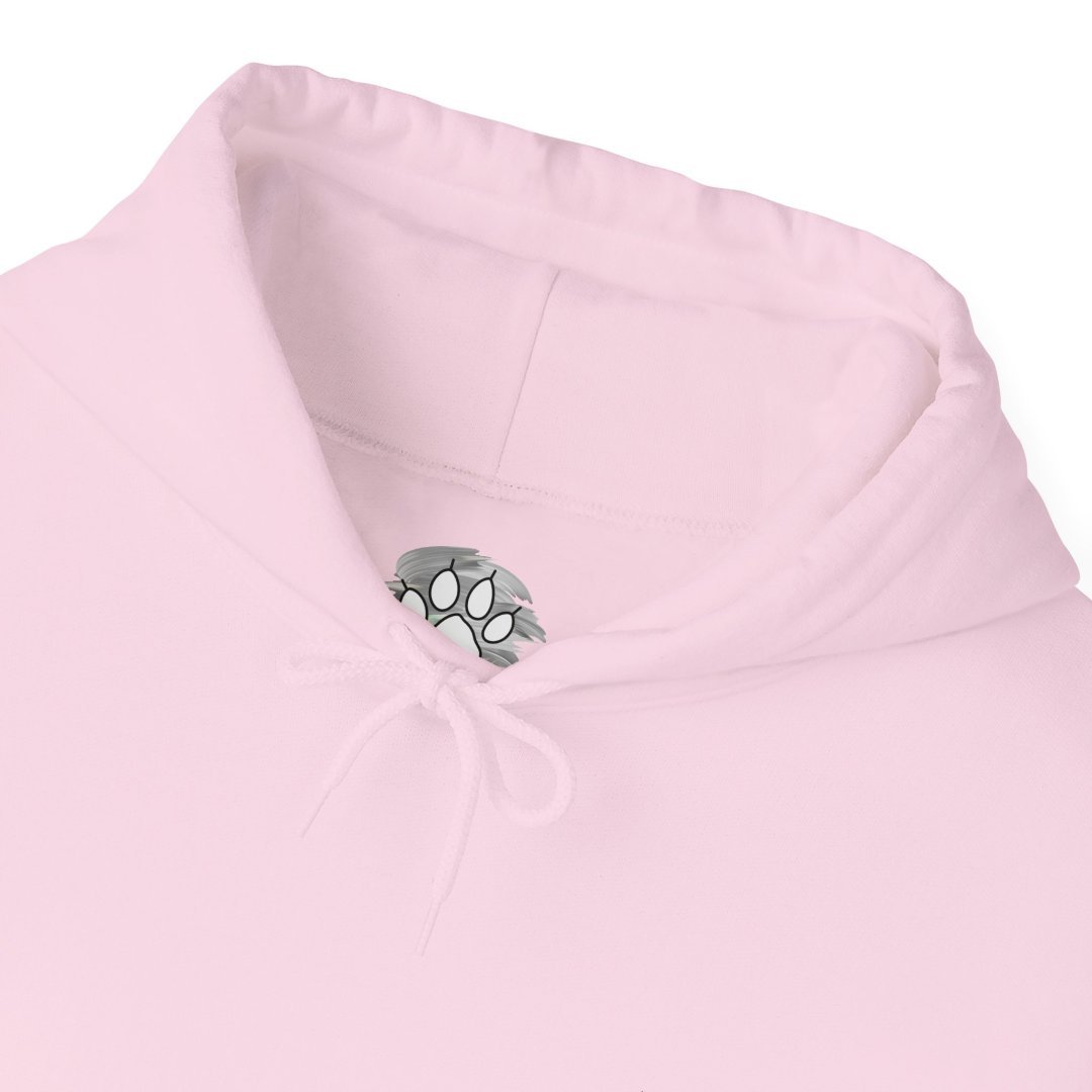 11543011144497777264_2048.jpeg Close-up of a light pink hoodie with a paw print tag inside.