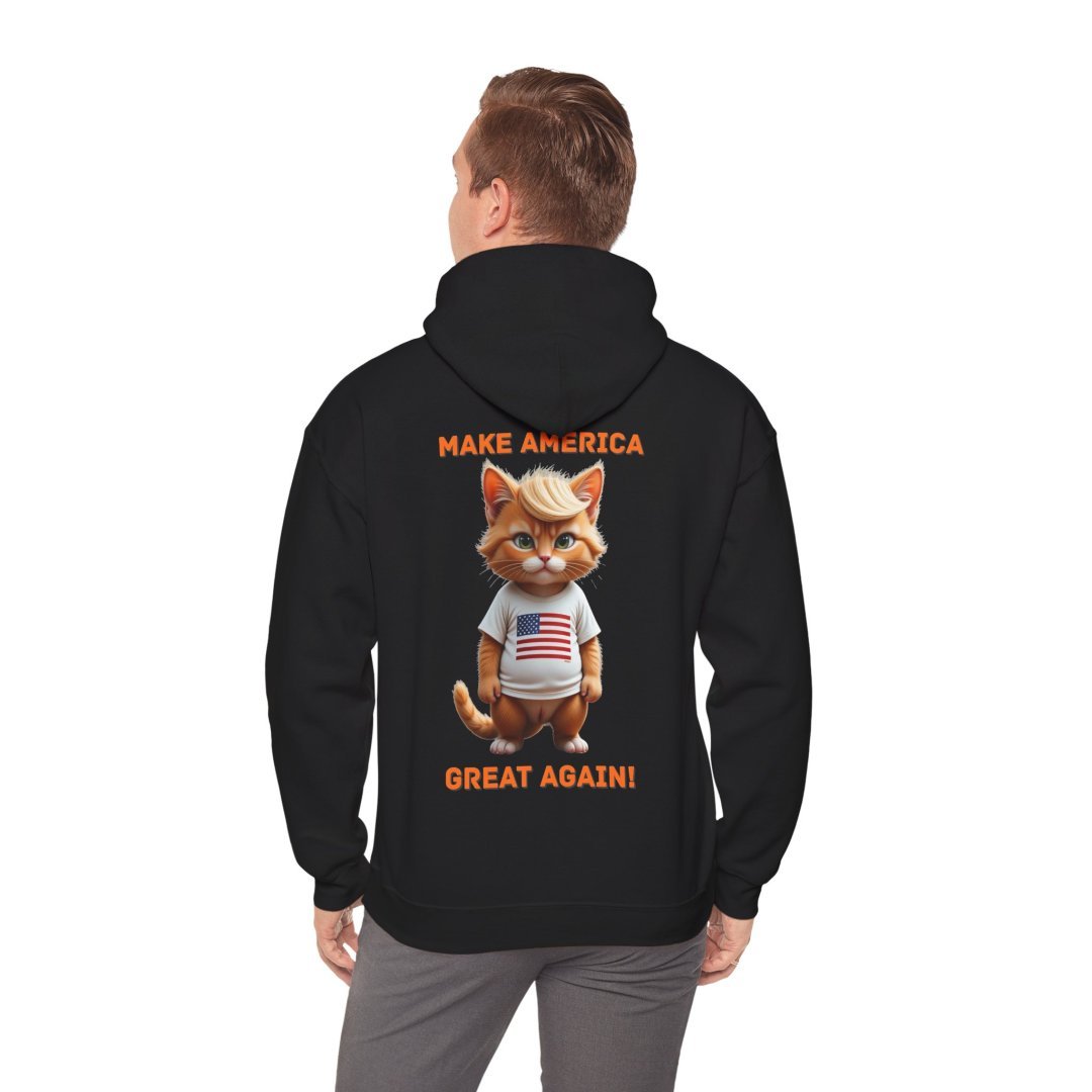 12824903262416196699_2048.jpeg Man wearing a hoodie with a cartoon cat and 'Make America Great Again' text.