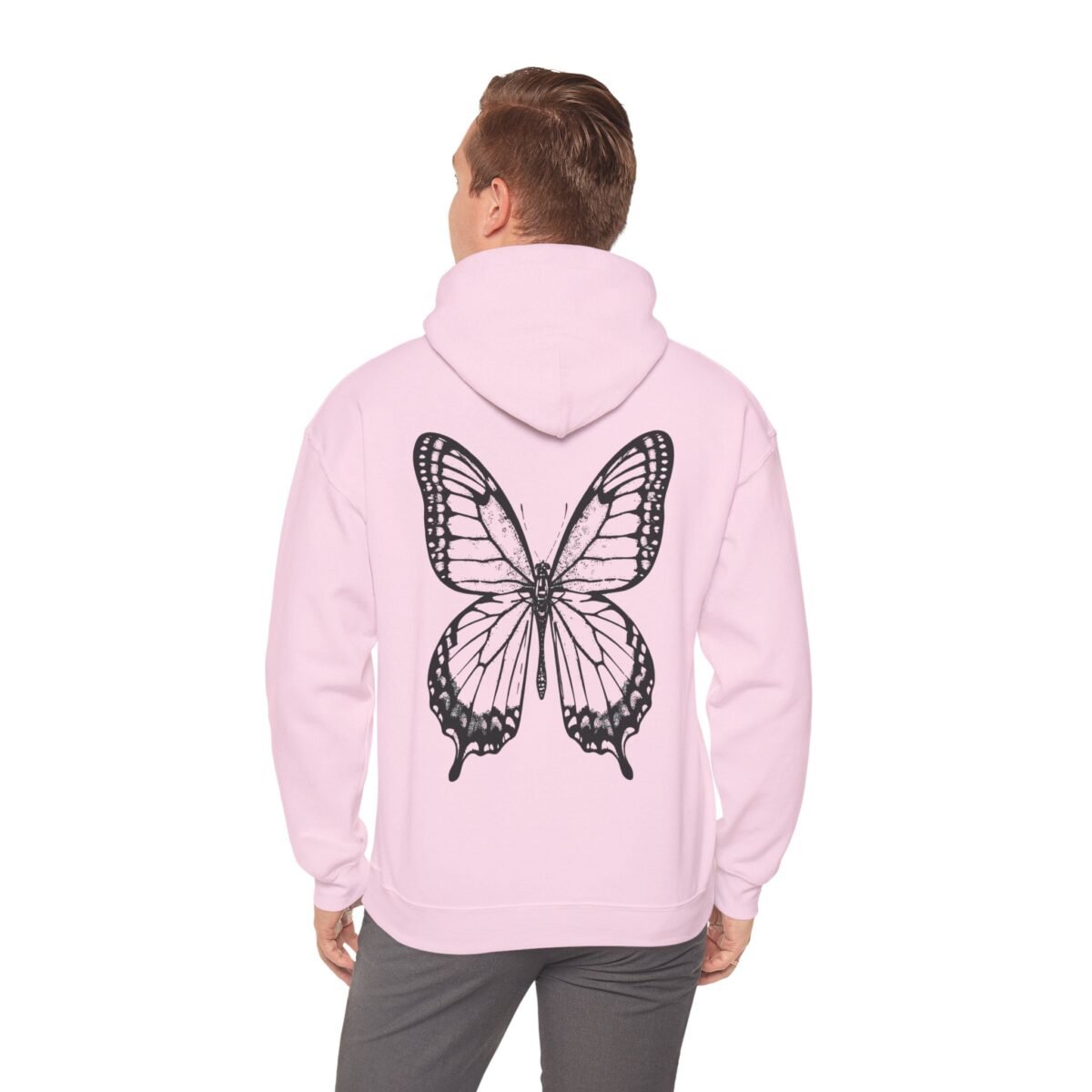 13206131710407271841_2048.jpeg Light pink hoodie with a large black butterfly design on the back.